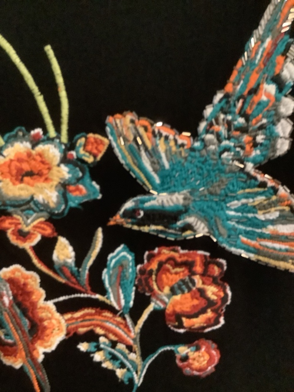 INC  Black Sweater with Teal and Orange Embroidered design.